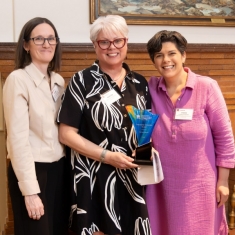 From left, Professor Sarah McMahon, Community Partner Award honoree Mariam Merced, and Associate Professor Chiara Sabina